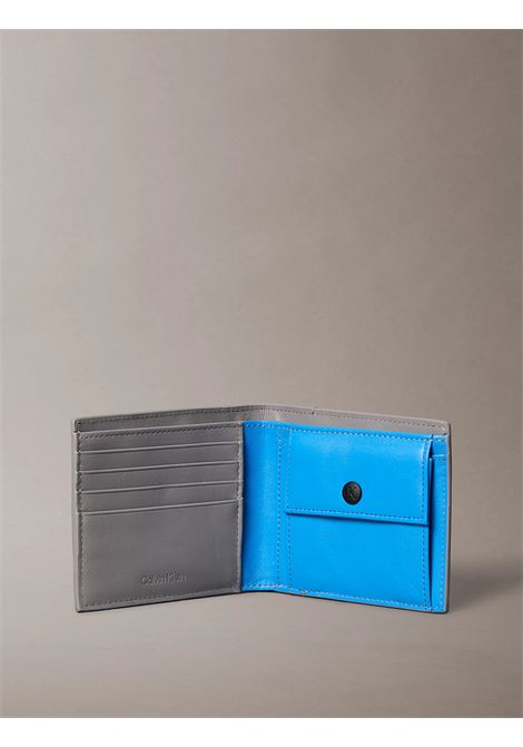 Portafoglio a libro con monologo stampato CALVIN KLEIN | LV04D1156GPBB
